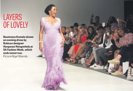  ?? Picture:Nigel Sibanda ?? Basetsana Kumalo shows an evening dress by Rubicon designer Hangwani Nengovhela at SA Fashion Week, which ends tomorrow.