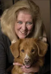  ?? PETER LEE, RECORD STAFF ?? Laurie Gleiser and her Nova Scotia duck tolling retriever, Ty.