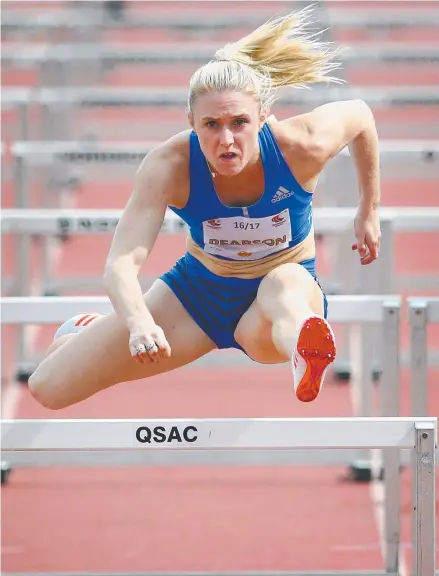 ?? Picture: LIAM KIDSTON ?? Sally Pearson wins the 100m hurdles final of the Queensland state titles at QSAC yesterday.
