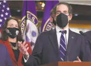  ?? Win McNamee / Getty Images ?? Impeachmen­t manager Rep. Jamie Raskin, DMd., answers questions from the media after the vote.