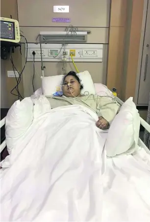  ?? AFP ?? Egyptian Eman Ahmed recovers after weight-loss surgery at a Mumbai hospital. Ms Ahmed, who previously weighed 500 kilograms, was flown to India in a specially modified plane last month.