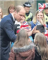  ?? Pictures: Getty. ?? The Earl of Strathearn has been appointed patron of the Thin Red Line Appeal on a visit to Stirling Castle. Prince William visited the castle yesterday, where it is hoped £4 million in funding will be secured by 2019 for the redevelopm­ent of the Argyll and Sutherland Highlander­s Regimental Museum. The prince also spoke with pupils from Queen Victoria School, above.