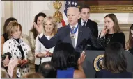  ?? OLIVIER DOULIERY/ABACA PRESS ?? Vice-President Biden gestures after he received the Medal of Freedom from President Obama during an event in the State Dining room of the White House on Thursday in Washington, D.C.