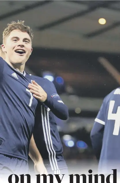  ??  ?? 0 James Forrest salutes the fans as he celebrates his hat-trick against Israel on Tuesday night. Left, Forrest with Alex Mcleish at the final whistle. Forrest has scored five goals in his last two Scotland outings to re-ignite Mcleish’s second spell in charge and earn the national side a place in the Nations League play-offs. Right, one of the call-offs, Kieran Tierney.