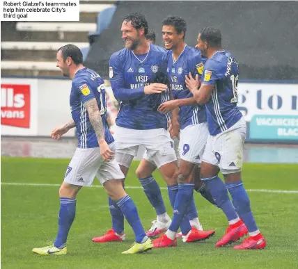  ??  ?? Robert Glatzel’s team-mates help him celebrate City’s third goal