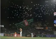  ?? ERIC RISBERG — THE ASSOCIATED PRESS FILE PHOTO ?? Former San Francisco Giants relief pitcher George Kontos stands on the mound as seagulls fly over AT&T Park in the 11th inning of a baseball game against the San Diego Padres in San Francisco. The birds usually feed at the dumps, but marine biologists...