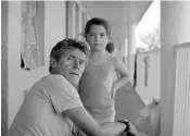  ?? COURTESY OF A24 ?? Willem Dafoe, left, and Brooklynn Prince star in “The Florida Project,” now playing in Orlando and other select cities.