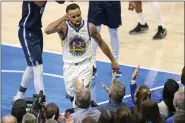  ?? SCOTT STRAZZANTE — THE ASSOCIATED PRESS ?? The Warriors’ Stephen Curry celebrates a basket and a Mavericks’ foul during Game 3of the Western Conference finals on May 22 in Dallas.