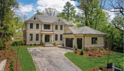  ?? PHOTOS COURTESY TATIANA KAGAN ?? YOU’RE HOME! This house at 46 Exeter St. in West Newton is brand new and built to impress with an 8,000-square-foot interior that features plenty of room whether it be in your spacious kitchen, enormous living room or palatial master bedroom.