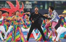  ?? Courtesy: IPL ?? Actors Varun Dhawan and Prabhu Deva dance to the tunes of some of the famous Bollywood numbers.