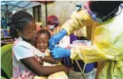  ?? JEROME DELAY AP FILE ?? A child is vaccinated against Ebola in Congo. About 300 people are being monitored for the infection in Congo.