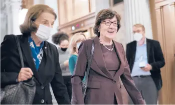 ?? J. SCOTT APPLEWHITE/AP ?? Sens. Susan Collins, center, and Dianne Feinstein arrive for a vote Thursday. During confirmati­on, Brett Kavanaugh assured Collins that the right to abortion was “settled law,” but his recent comments sounded a different note.