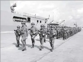  ?? ROEL PAREÑO ?? Soldiers of the Marine Battalion Landing Team 3 from Sulu prepare for deployment to Palawan under the Western Command yesterday.