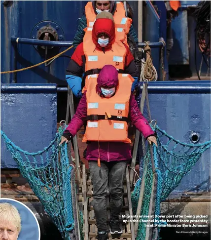  ?? Dan Kitwood/Getty Images ?? Migrants arrive at Dover port after being picked up in the Channel by the border force yesterday Inset: Prime Minister Boris Johnson