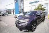  ?? DAVID ZALUBOWSKI AP ?? Honda expects factories to make more vehicles this year despite a chip shortage and supply chain snags. But dealers are starting the year with fewer vehicles.