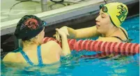  ?? SHARON MERKEL/SPECIAL TO THE MORNING CALL ?? Emmaus’ Gloria Klees, right, won the girls 50-yard freestyle at the Parkland-Emmaus meet in December at Parkland High School.
