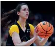  ?? (AP/Morry Gash) ?? Iowa’s Caitlin Clark scored 41 points during the Hawkeyes’ 94-87 Elite Eight win against LSU, which was the most-watched women’s college basketball game ever with 12.3 million viewers tuning in.
