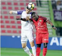  ?? Supplied photo ?? Al Ain and Shabab players duel for the ball during their Arabian Gulf League match played on Friday. —