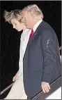  ?? AP/CAROLYN KASTER ?? President Donald Trump departs Air Force One with his son, Barron, as they arrive late Friday at the airport in West Palm Beach, Fla., for the weekend. Trump later took to Twitter to rail against what he called the “Russian Witch Hunt.”