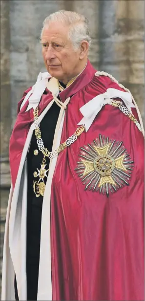  ??  ?? The Prince of Wales attends the Order of the Bath service at Westminste­r Abbey, London, in robe and military uniform.