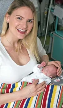  ??  ?? Journey: Ashley Ruddy’s son Michael was born at 24 weeks. She said it was “amazing” to be so involved in her son’s care through the hospital’s integrated family programme. Right, Jo and Leo Mahoney with their newborn Oscar