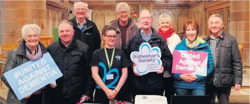  ??  ?? William McCandless (far right) has organised a service for dementia sufferers to be attended by church members and families on Maundy Thursday