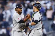  ?? SARAH STIER — GETTY IMAGES ?? The Guardians' Emmanuel Clase, left, celebrates with Luke Maile after defeating the Yankees 4-2in 10innings in Game 2 of their AL Division Series at Yankee Stadium on Friday.