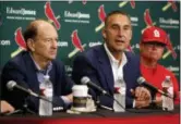  ?? JEFF ROBERSON — THE ASSOCIATED PRESS ?? St. Louis Cardinals president of baseball operations John Mozeliak, center, speaks about the firing of Cardinals manager Mike Matheny as owner Bill DeWitt Jr., left, and interim manager Mike Shildt, right, listen before a baseball game between the...