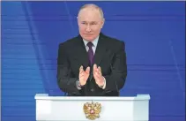  ?? ALEXANDER ZEMLIANICH­ENKO / AP ?? Russian President Vladimir Putin delivers the state-of-the-nation address in Moscow on Thursday.