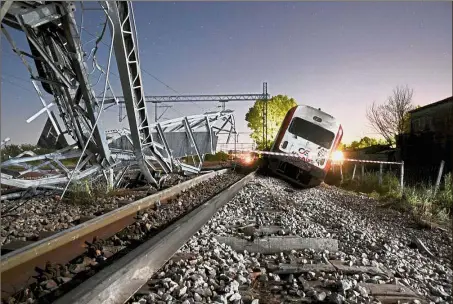  ??  ?? Derailed: A train carriage after coming off the rails at Adendro in northern Greece. — Reuters