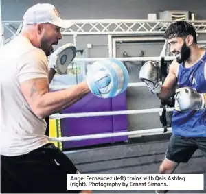  ??  ?? Angel Fernandez (left) trains with Qais Ashfaq (right). Photograph­y by Ernest Simons.