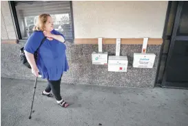  ?? Melissa Phillip / Houston Chronicle ?? Cherlyn Glanville, a retired Houston ISD teacher, leaves a doctor’s office Tuesday. After two car wrecks, she needs 10 medication­s and regular treatments to ease pain. But rising out-of-pocket costs could make paying for those difficult.