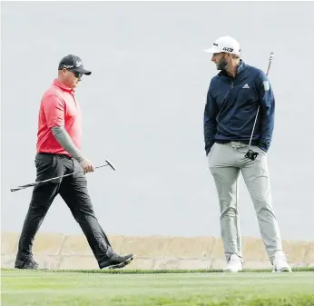  ?? JEFF GROSS/GETTY IMAGES ?? Ted Potter Jr., left, 246th in the world golf rankings, got the better of No. 1 Dustin Johnson by three strokes in their final-round showdown to win the AT&T Pebble Beach Pro-Am at Pebble Beach Golf Links on Sunday. It was Potter’s second tour win and...