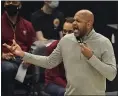  ?? TONY DEJAK — THE ASSOCIATED PRESS ?? Cavaliers head coach J.B. Bickerstaf­f gives instructio­ns to players in the first half of a game against the Grizzlies on Jan. 11.