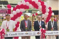  ?? ?? EXPLORE CANADIAN FLAVORS. At Metro Ayala during the opening of the Canadian food promo from left, Metro Group’s Dr. Edward Gaisano and Manuel Alberto, Canadian Ambassador David Bruce Hartman and Margaret Gaisano Ang.