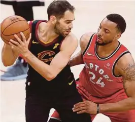  ?? EPA PIC ?? Toronto’s Norman Powell (right) defends against Cleveland’s Jose Calderon during game four of their Eastern Conference semi-finals on Monday.