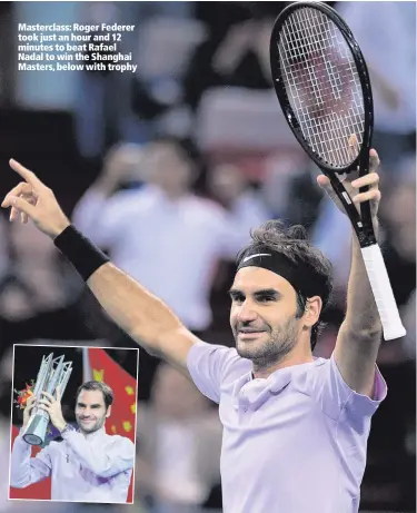  ??  ?? Masterclas­s: Roger Federer took just an hour and 12 minutes to beat Rafael Nadal to win the Shanghai Masters, below with trophy