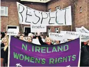  ??  ?? Protest: Members of the Belfast Feminist Network demonstrat­e against Stuart Olding (inset left) and Paddy Jackson (inset right) outside Ulster’s ground