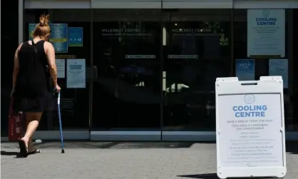  ?? Photograph: Jennifer Gauthier/Reuters ?? A woman enters a cooling centre in Vancouver.