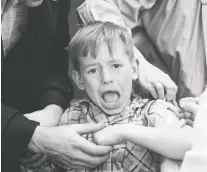  ?? LIBRARY AND ARCHIVES CANADA/NATIONAL FILM BOARD ?? An unnamed Canadian boy being vaccinated in 1959.