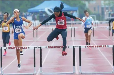  ?? MIKEY REEVES/FOR DIGITAL FIRST MEDIA ?? Upper Dublin’s Madison Langley-Walker (right) and PW’s Taylor O’Brien battle it out during the District 1 Track and Field Championsh­ips Saturday.