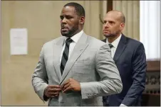  ?? E. JASON WAMBSGANS — CHICAGO TRIBUNE VIA AP, FILE ?? In this June 6, 2019, file photo, singer R. Kelly pleaded not guilty to 11 additional sex-related felonies during a court hearing before Judge Lawrence Flood at Leighton Criminal Court Building in Chicago. An updated federal indictment filed on Friday, Feb. 14, 2020, in Chicago, refers to yet another minor accusing R. Kelly of sexual misconduct, adding to the jailed singer’s mounting legal challenges across three states.