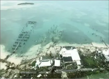  ??  ?? An aerial view shows devastatio­n after Hurricane Dorian hit the Abaco Islands in the Bahamas, September 3, 2019. Michelle Cove/Trans Island Airways/via REUTERS