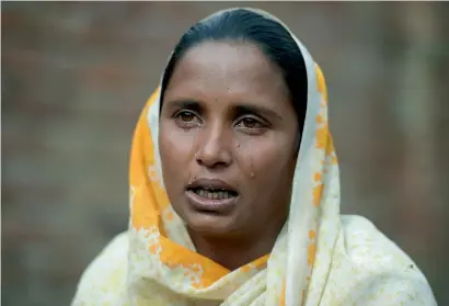  ?? AFP ?? Thirty-year-old Bushra Bibi, who sold one of her kidneys, cries as she speaks during an interview at her home in Bhalwal, Sargodha District, in Punjab Province. —