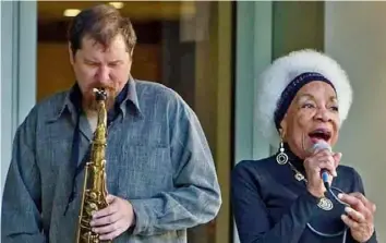  ?? Neil Smilek ?? Musician Rex Trimm and vocalist Elizabeth "Betty" Asche Douglas perform in 2019 at the Lincoln Park Performing Arts Center in Midland, Beaver County. They will perform together Aug. 18 at the first outdoor salon in the Bloomfield Garden Club series.