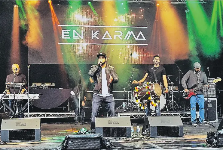  ??  ?? Bhangra rock group En Karma has gained worldwide exposure after signing with giant Indian music label T-Series for the band’s latest single, She Kills.