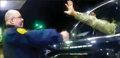  ??  ?? Afraid: Footage shows officer Joe Gutierrez pepper-spraying Caron Nazario in Virginia