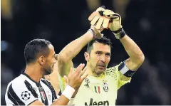  ??  ?? Face of defeat: Juventus goalkeeper Gianluigi Buffon applauds the fans at the end