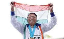  ??  ?? AUCKLAND: In this photograph taken on April 24, 2017, Indian runner Man Kaur, 101, celebrates after competing in the 100m sprint in the 100+ age category at the World Masters Games at Trusts Arena in Auckland on April 24, 2017. A 101-year-old Indian...