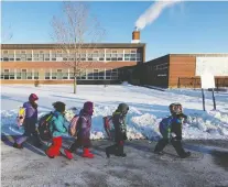  ?? BLAIR GABLE / REUTERS ?? Students return to in-class learning at Vincent Massey Public School in Ottawa after a four-week COVID-19 lockdown.